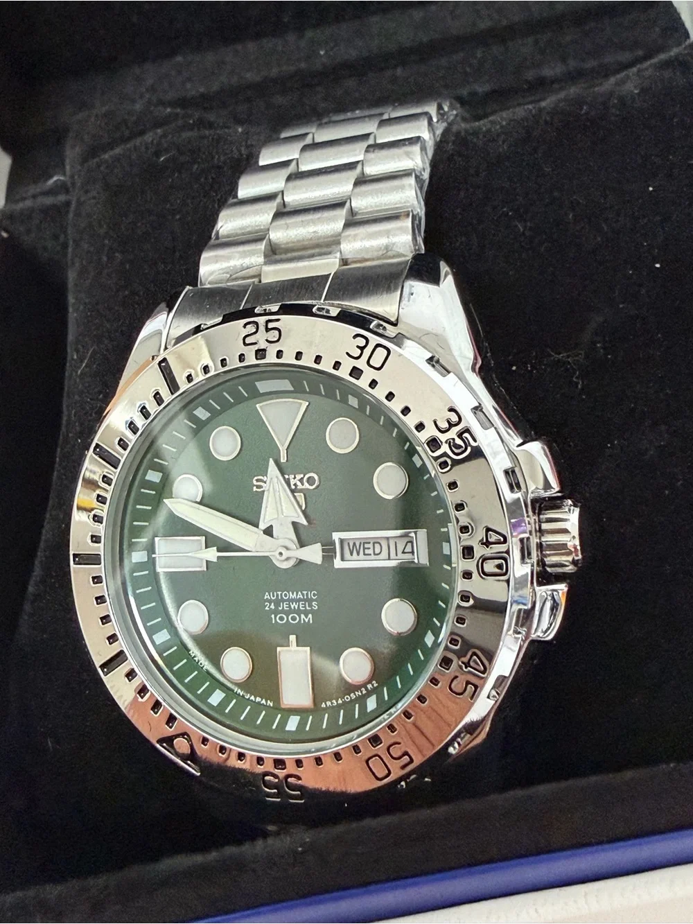 Seiko Stainless Steel Watch with Green Dial and Silver Bezel